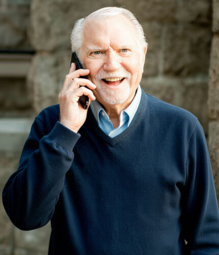 David Shean talking on the phone.